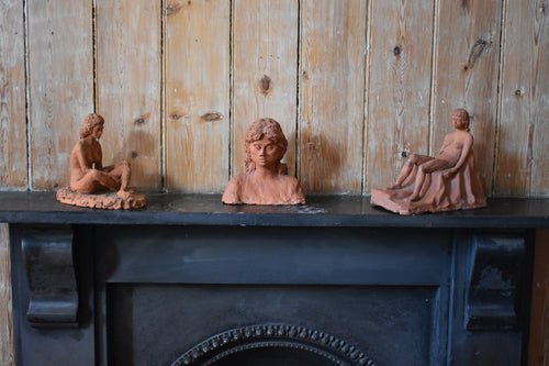 THREE CLAY FIGURES