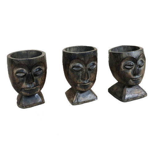 THREE WOODEN HEADS